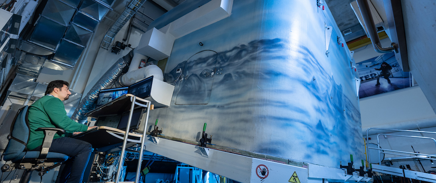 Researcher monitoring KITE WinterLab equipment for Rate My Treads testing